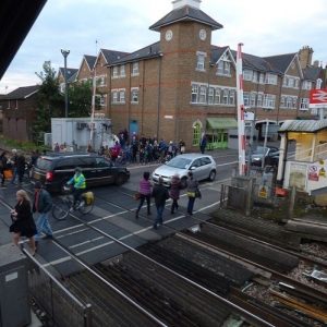 Mortlake, Sheen Lane, level crossing in rush hour, different view